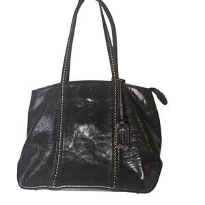 Old Trend large black leather shoulder bag with small stud accent.